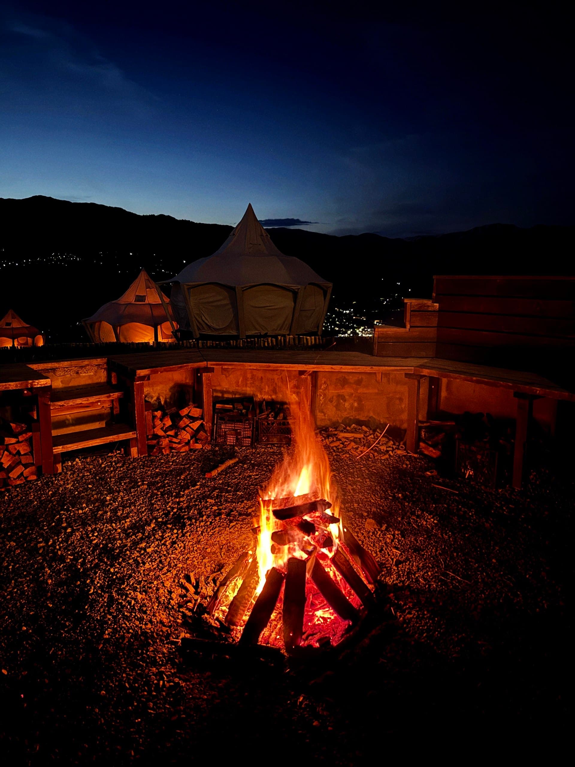 Evening campfire under a starry sky