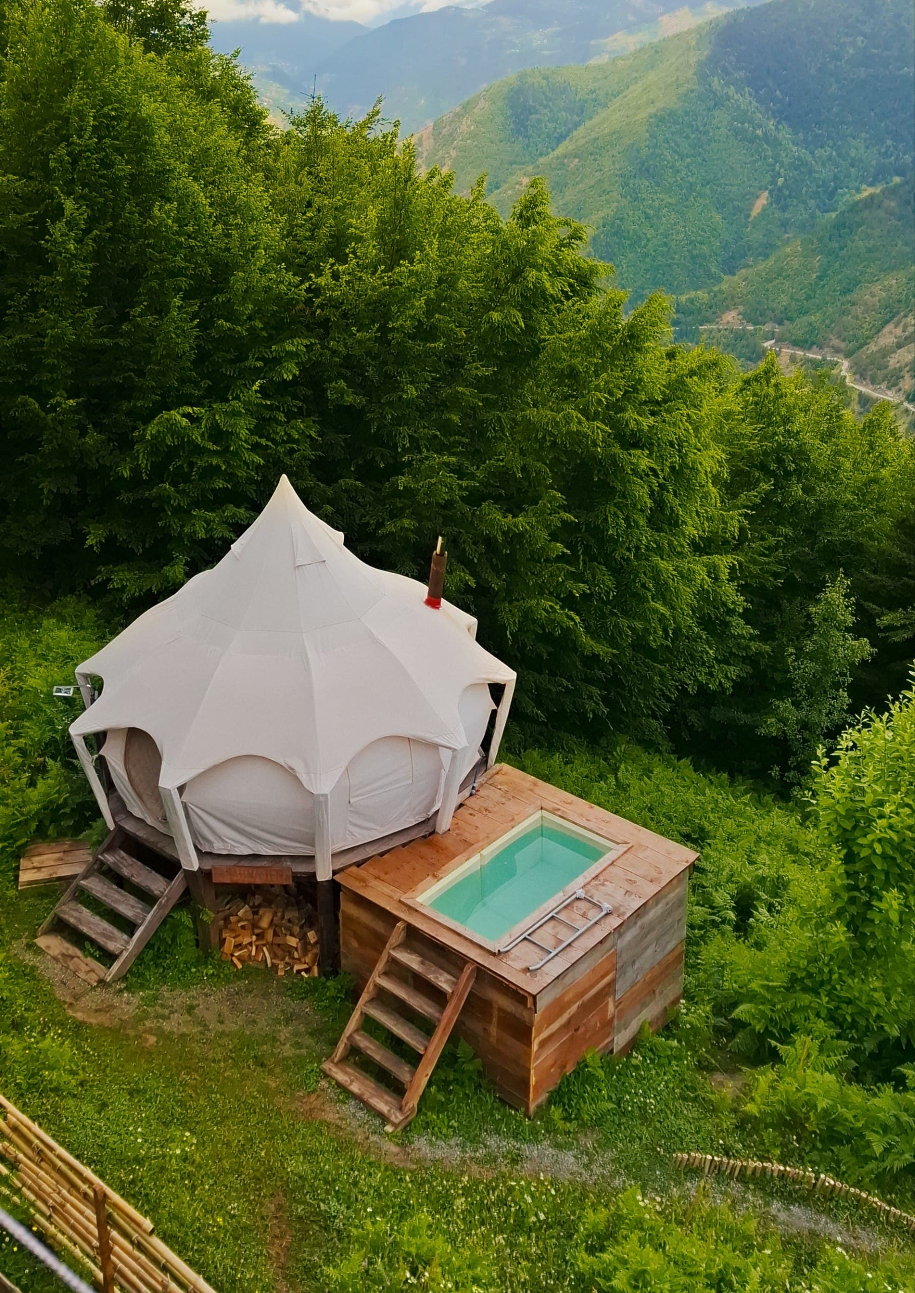 Wood-fired sauna tent among the trees